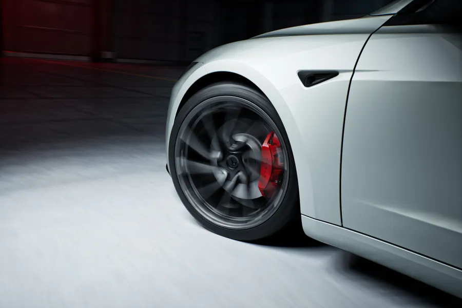 Tesla Model 3 Performance front wheel with red brake caliper