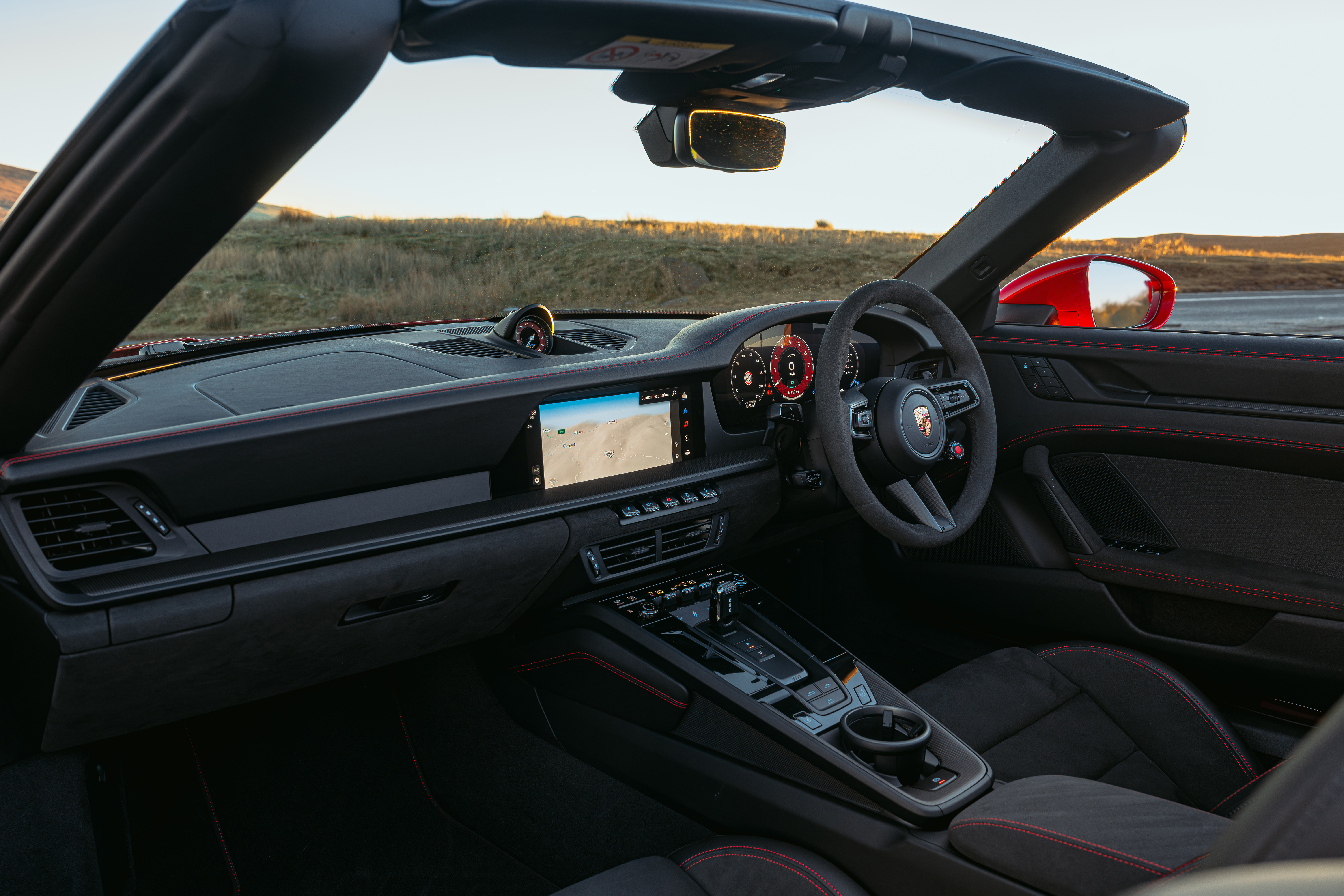 Porsche cabin with driver-focused dashboard